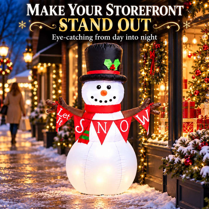 G128 5FT inflatable Christmas snowman with top hat, red scarf and Let It Snow banner lit up in a yard