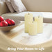 G128 set of three white flameless LED pillar candles in 6, 5, and 4 inch heights