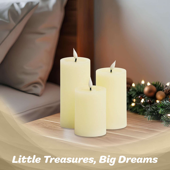 G128 set of three white flameless LED pillar candles in 6, 5, and 4 inch heights