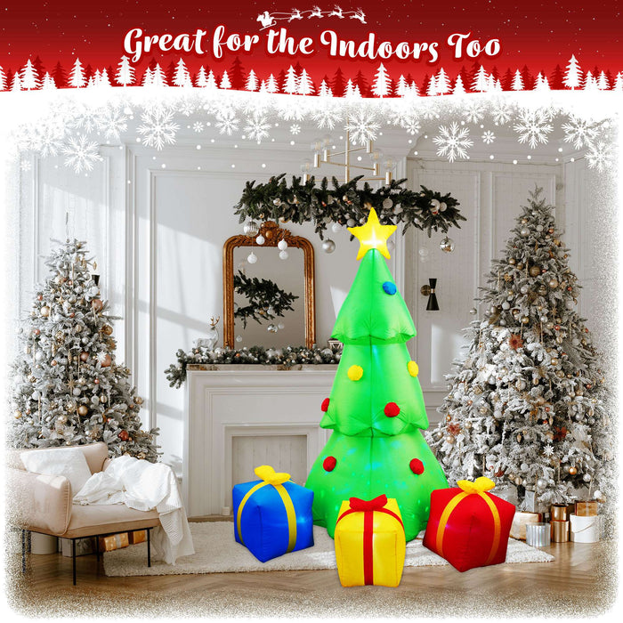 G128 7FT inflatable Christmas tree with three gift boxes and built-in LED lights lit up in a yard