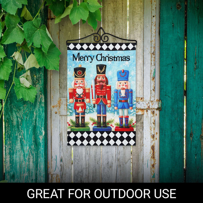 G128 12x18IN Merry Christmas Three Nutcrackers Garden Flag with 14IN Hanger