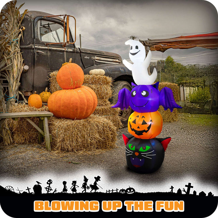 G128 6FT inflatable Halloween stack of a ghost, bat, pumpkin and black cat lit up on a lawn