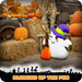 G128 3.5FT inflatable Halloween ghost in a witch hat holding a broom, glowing on a front porch