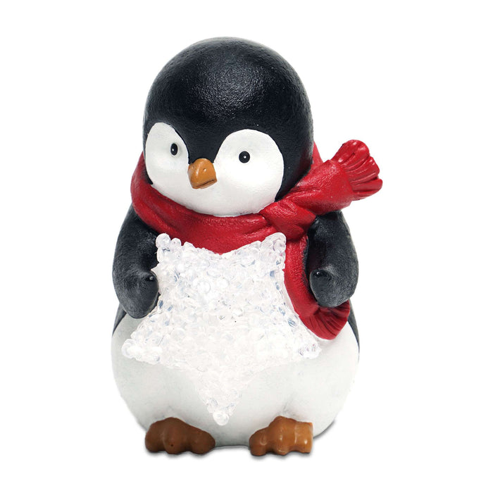 G128 resin penguin statue holding a light-up LED star, 5 inch tabletop holiday figurine