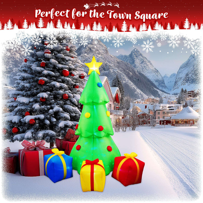 G128 7FT inflatable Christmas tree with three gift boxes and built-in LED lights lit up in a yard