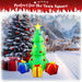 G128 7FT inflatable Christmas tree with three gift boxes and built-in LED lights lit up in a yard