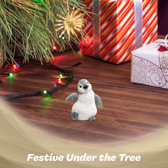 G128 small resin baby penguin statue, 4 inch tabletop winter figurine