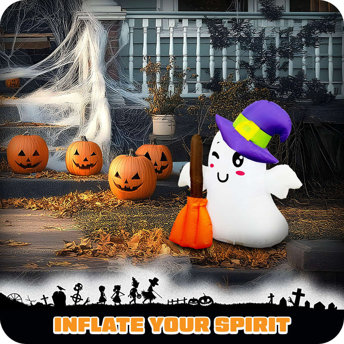 G128 3.5FT inflatable Halloween ghost in a witch hat holding a broom, glowing on a front porch