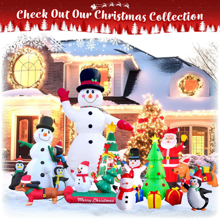 G128 7FT inflatable Christmas tree with three gift boxes and built-in LED lights lit up in a yard