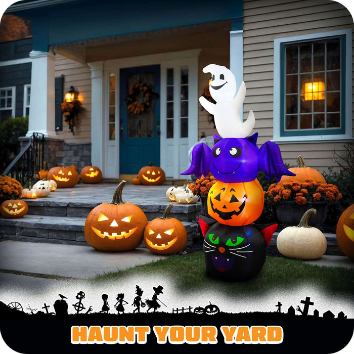 G128 6FT inflatable Halloween stack of a ghost, bat, pumpkin and black cat lit up on a lawn